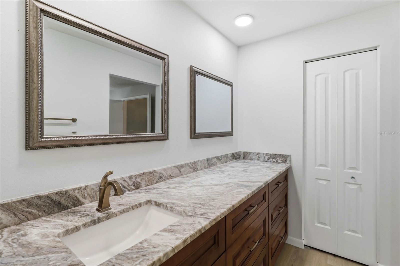 Second sink/vanity and linen closet in Primary