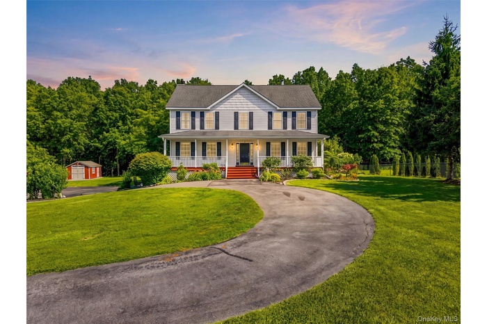 Twilight view of 604 Ridgebury Rd.