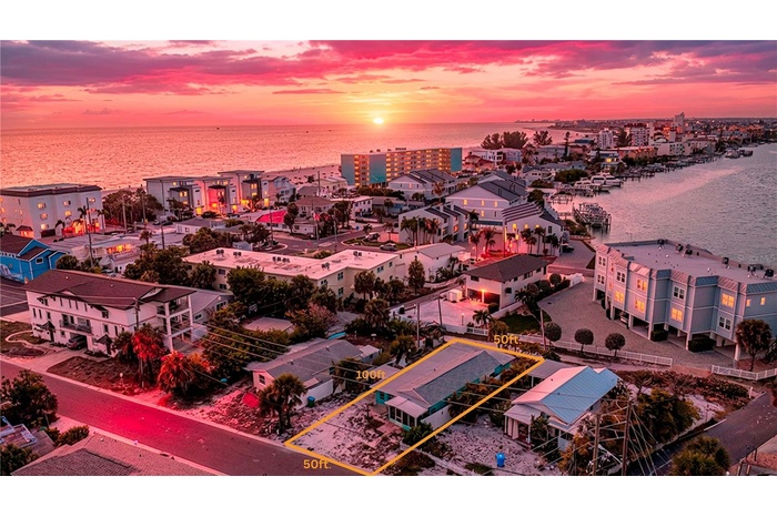 Enjoy epic sunsets and water views to the east and west from 2nd 3rd and rooftop terrace levels of 2 unit building designed for this lot.