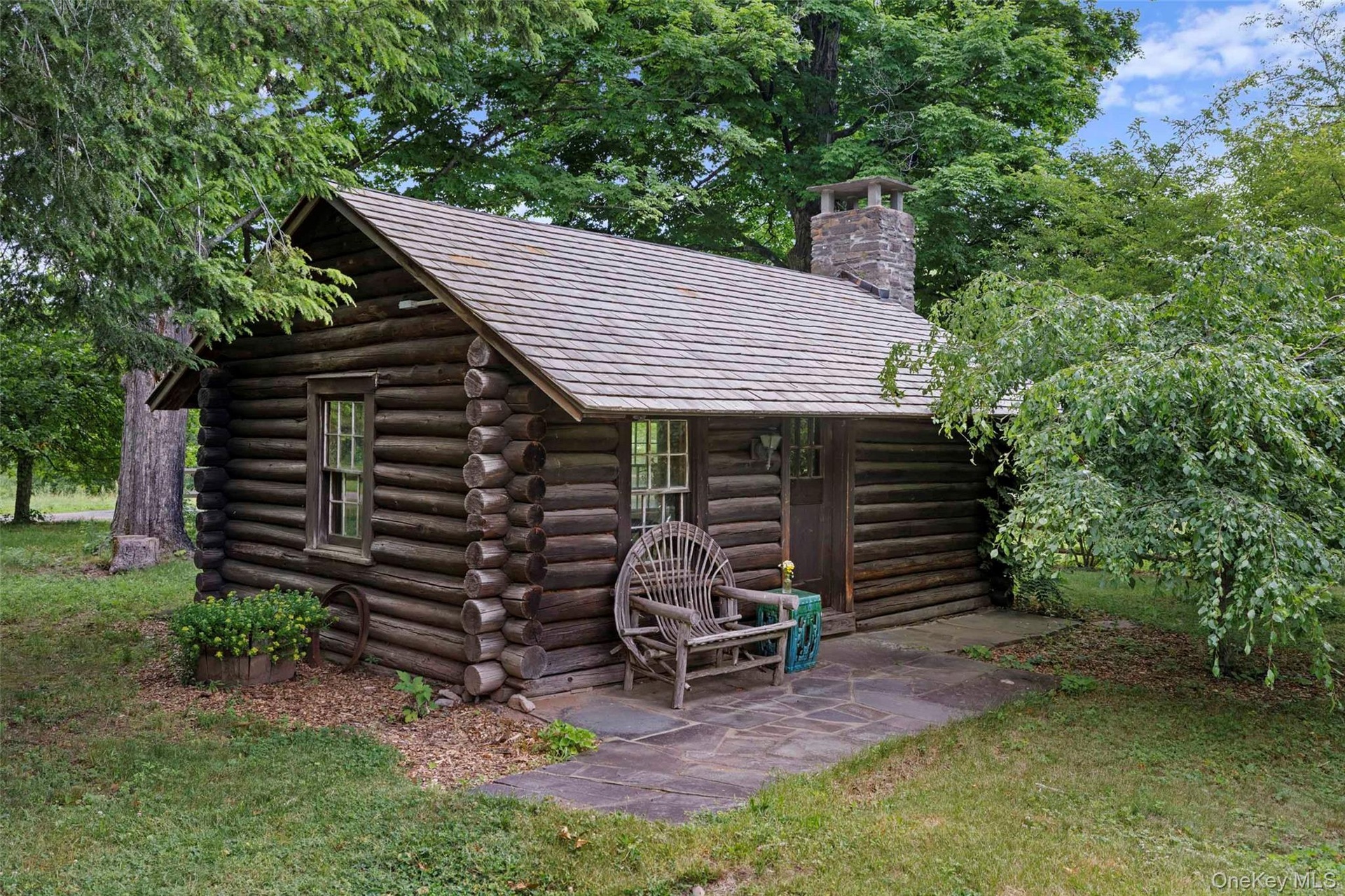 Authentic log cabin interior showcasing original timber construction and period character