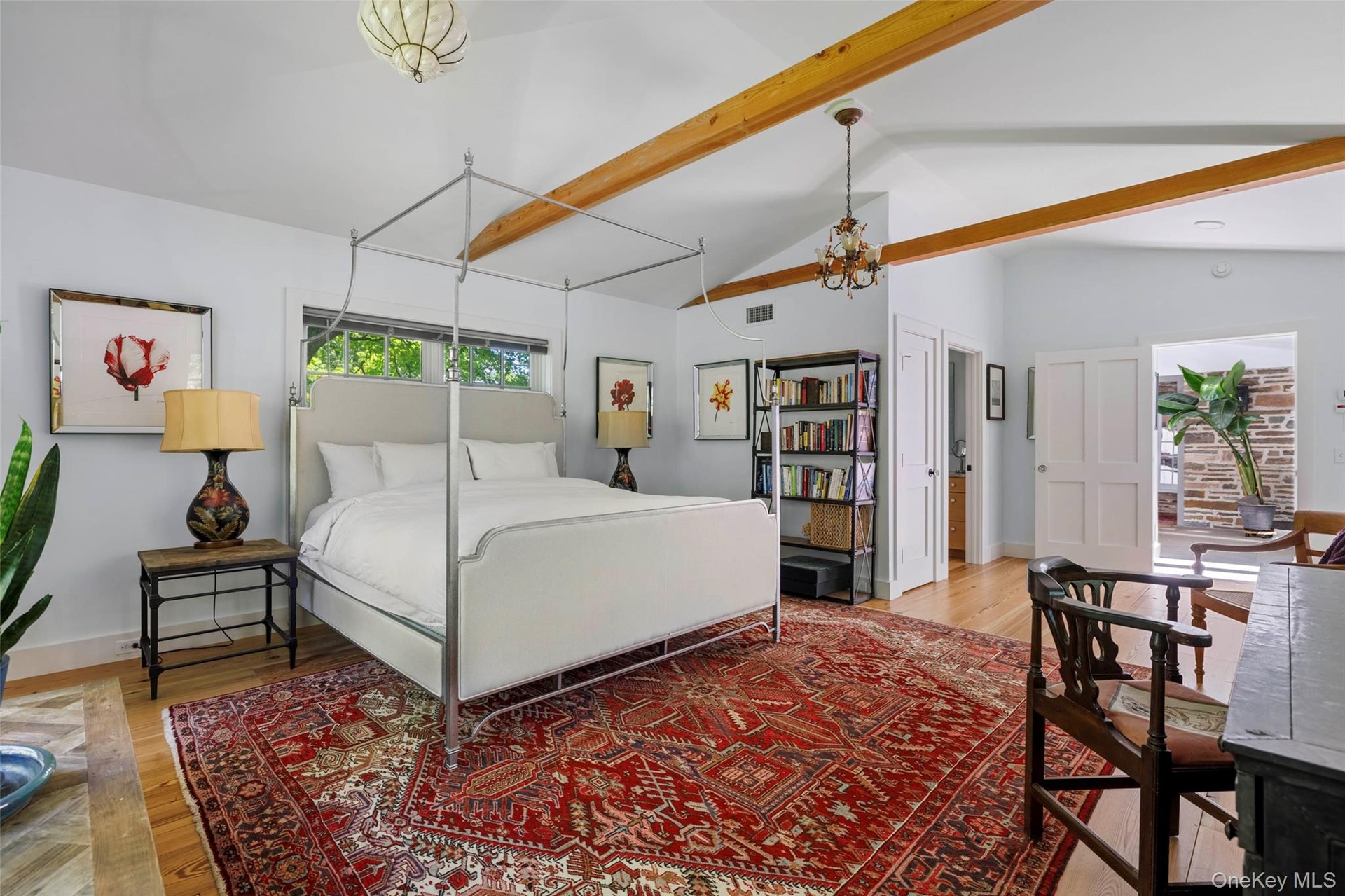 Privately situated guest suite overlooking the gardens