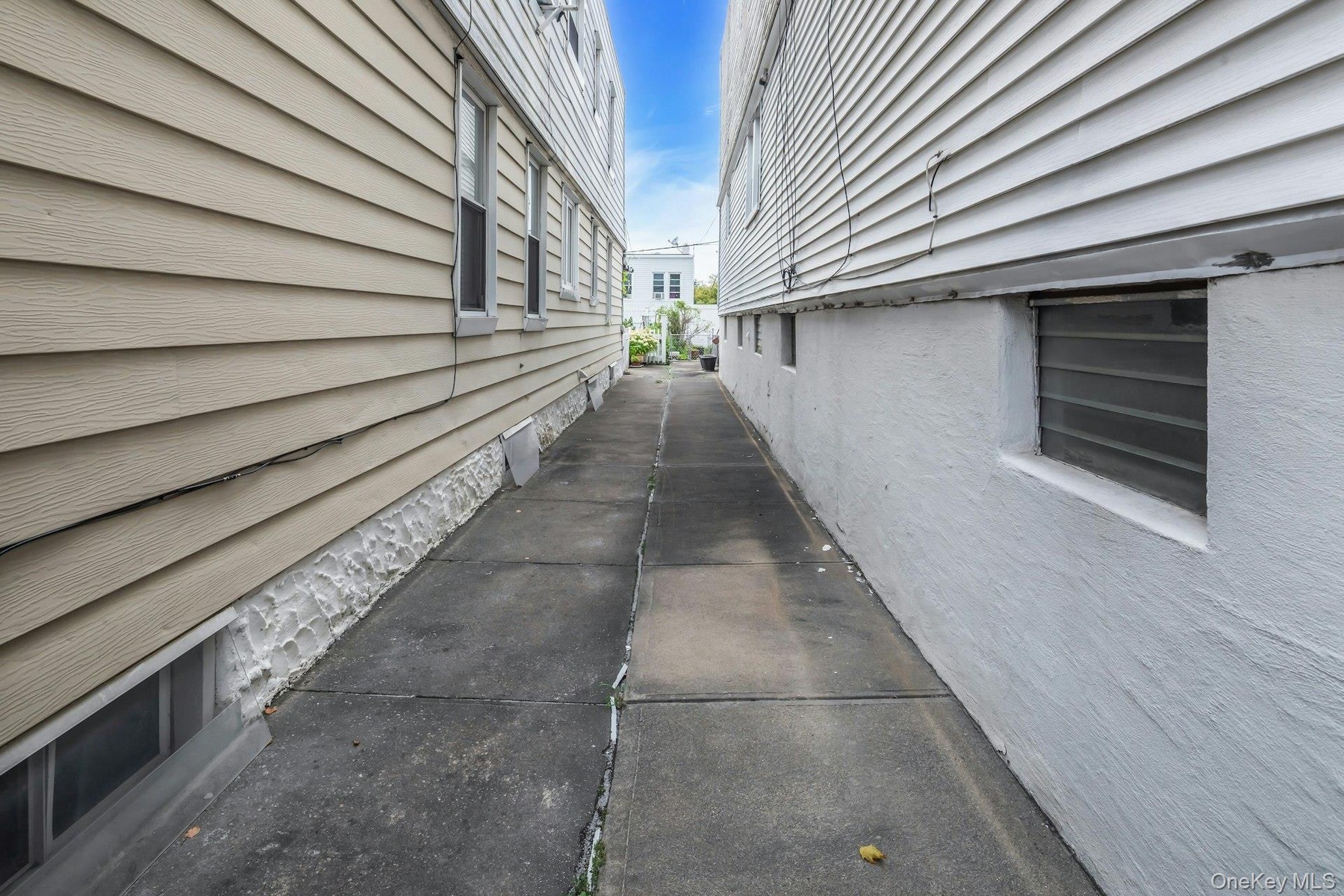 Shared (deep, long) driveway.
