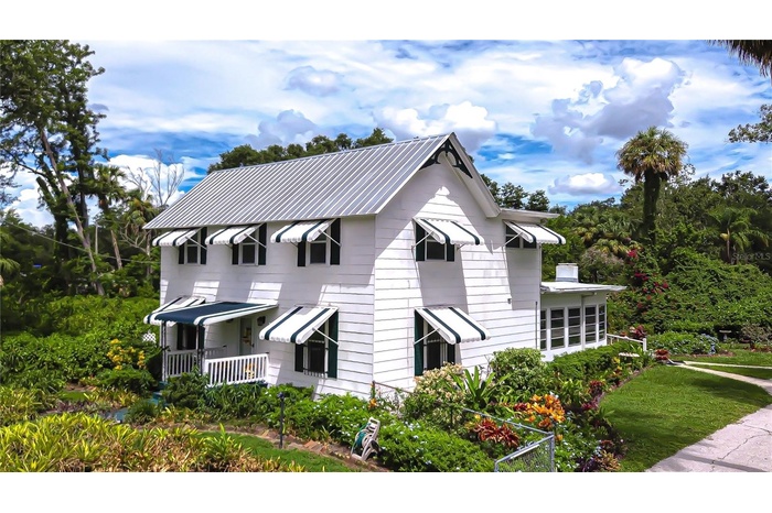 Historic 1910 residence on 6 picturesque acres.