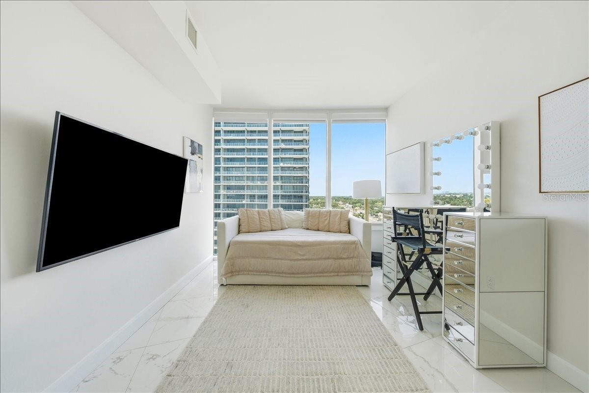 Comfortable guest suite with beautiful natural light.