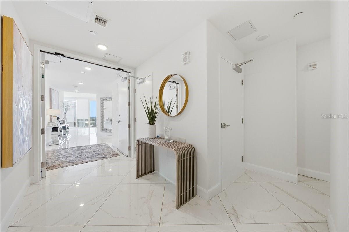 Elegant entrance into the open-concept residence.