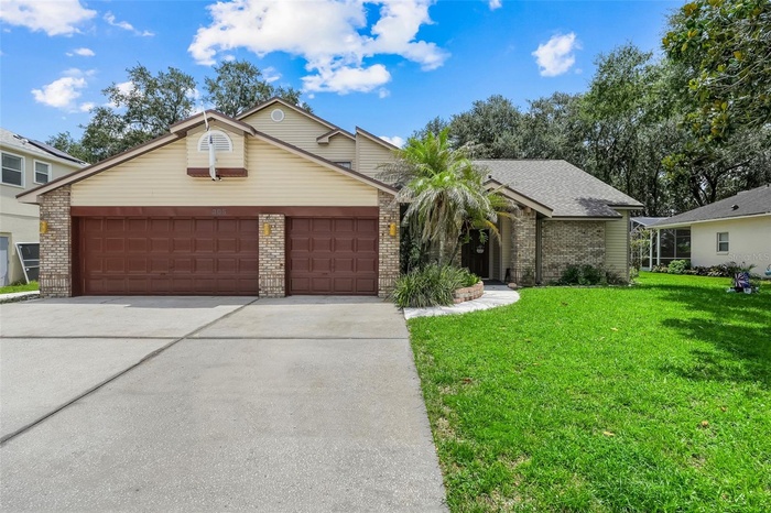 Exterior Front showcasing 3 car garage
