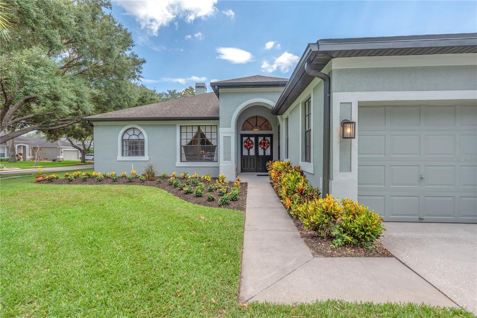 The yard has been professionally landscaped & maintained.