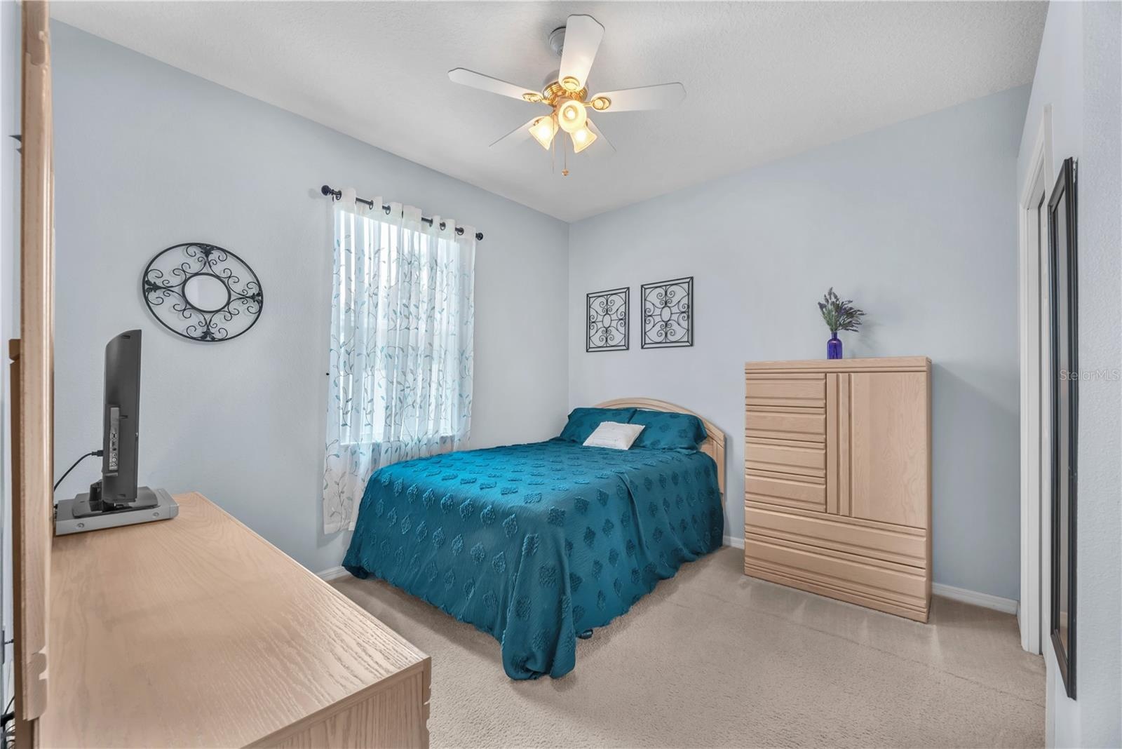 Secondary bedroom #4 is next to the 3rd full bathroom and is perfect for overnight guests, an in-law suite, or multi-generational living.