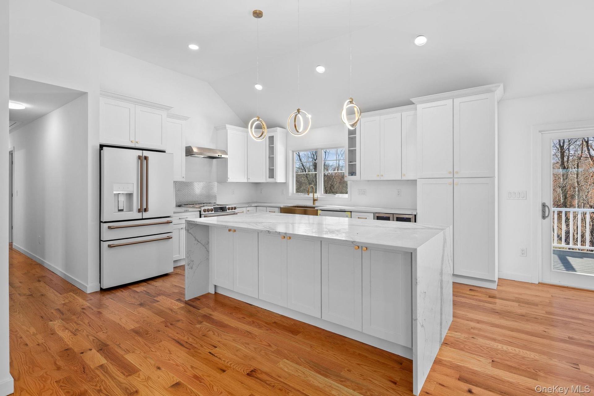 Photos shows one of the designs used by builders on a previously completed home. Appliances shown resulted in increased costs to buyers beyond listed 