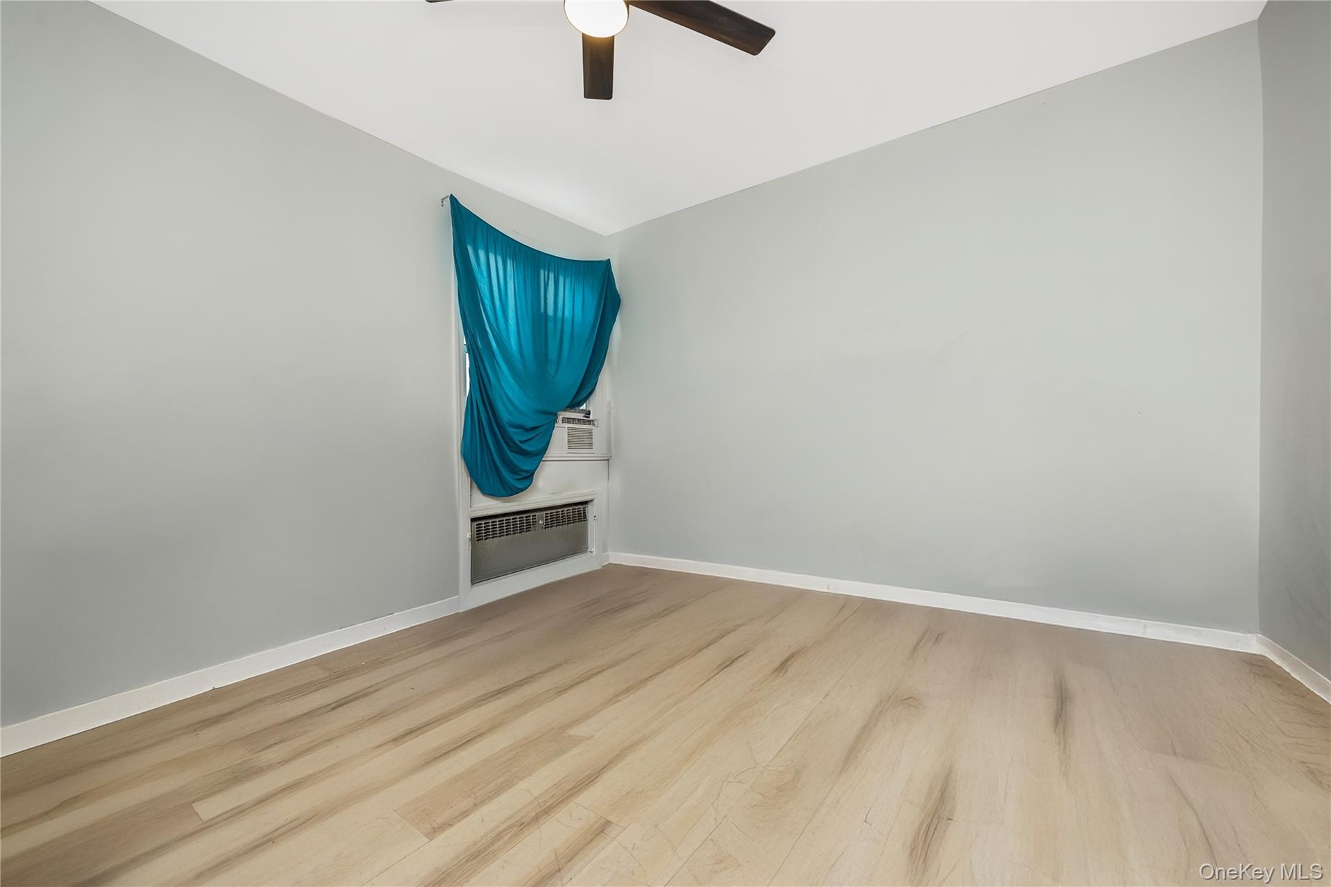 Apt 2F - Virtually decluttered bedroom view 2