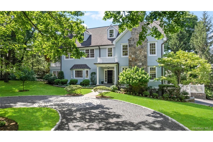 Welcome home to 21 Loder nestled amongst the trees in the center of it all!