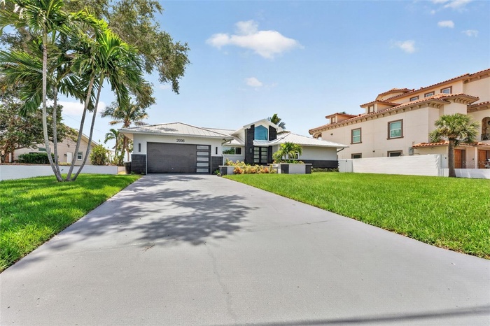 Spacious parking pad just painted & re-sealed with plenty of room for guests, boats, or an RV.