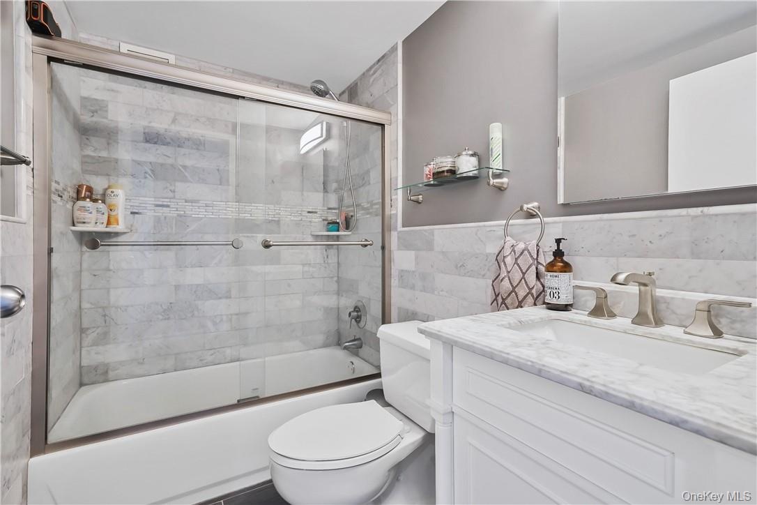 Marble Bathroom With Shower And Vanity