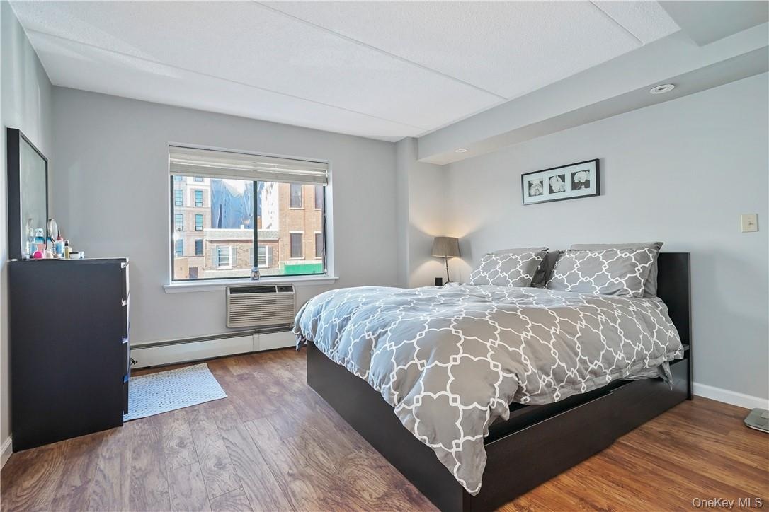 Primary Bedroom With Hardwood Floors