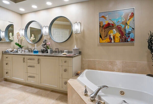 Primary BA w/ marble from floor to ceiling