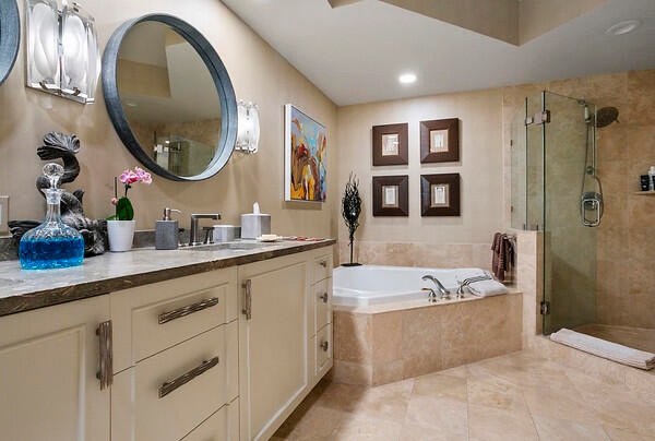Primary BA w/ fossilized stone double vanity counertop, Jacuzzi tub & separate walk-in shower