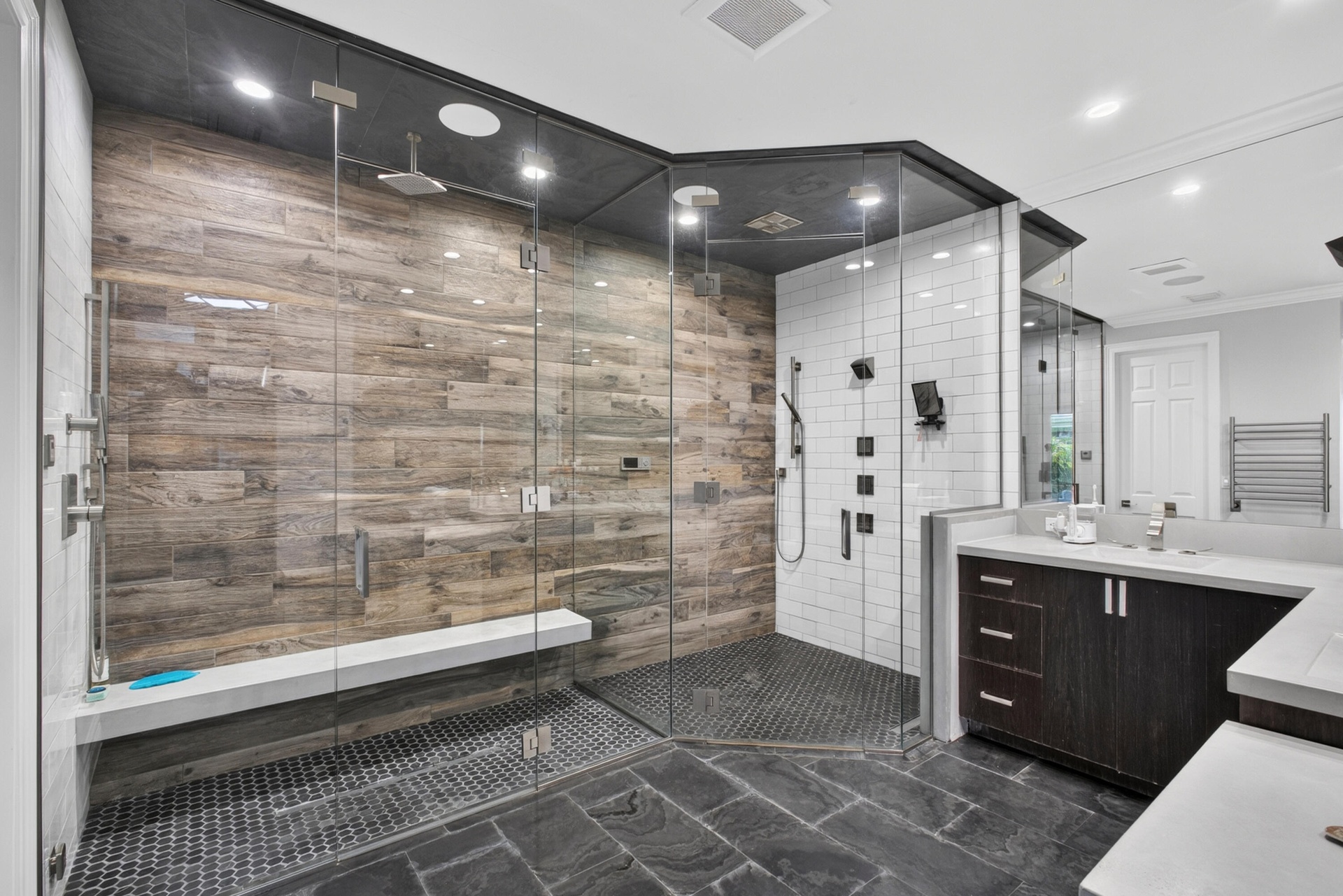 PRIMARY BATHROOM & STEAMSHOWER & SEPARATE STEAM ROOM LOCATED ON 1ST FLOOR - steamroom & steam shower are separated by glass.
