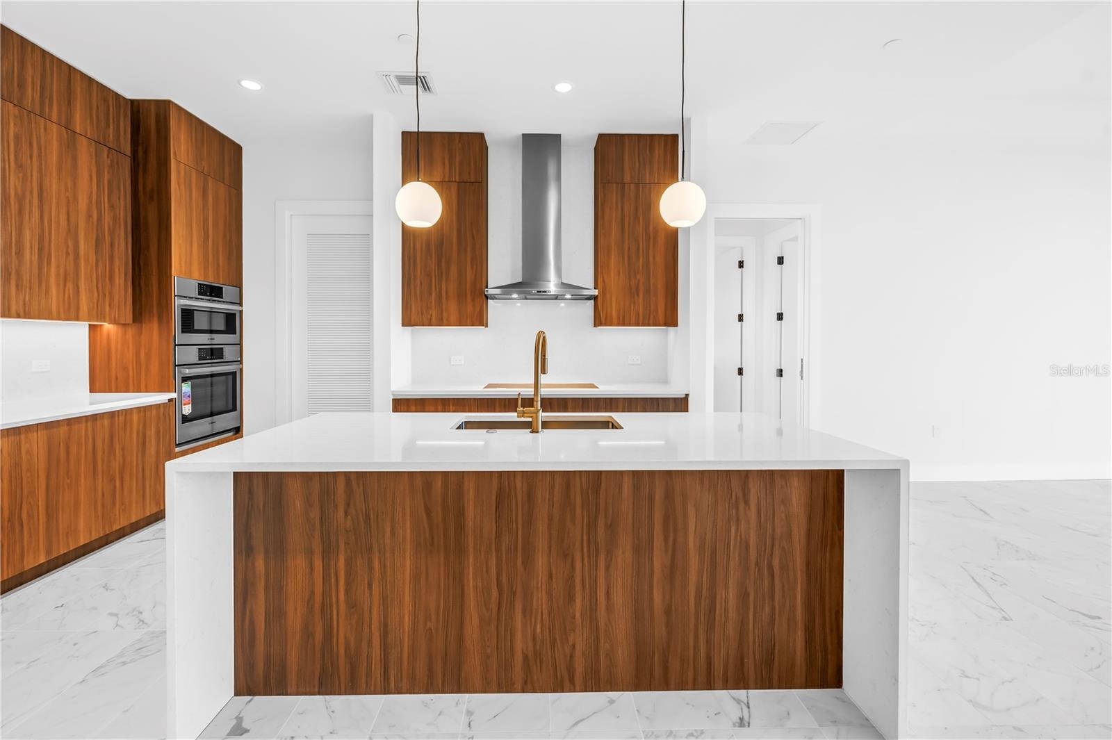 Quartz countertops with double waterfall edge