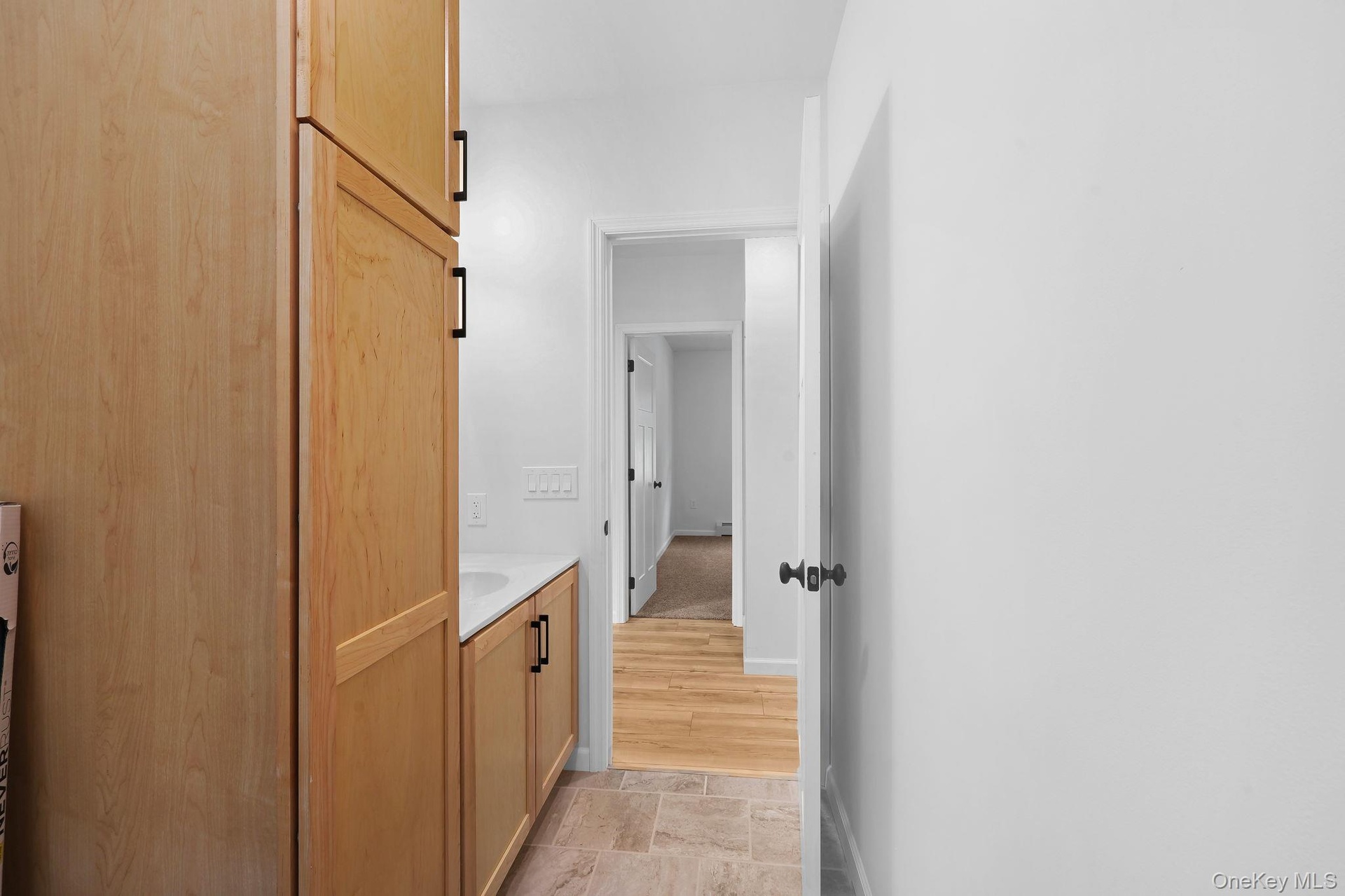 View from bathtub looking towards hallway