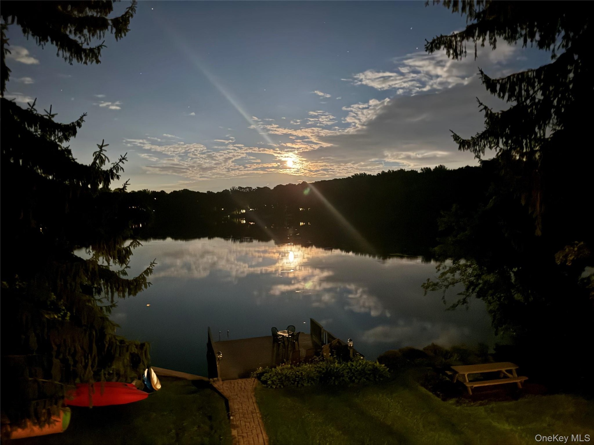 Experience the magic of moonlight on the lake. A one of a kind lake home and a lifestyle most only dream about.  Your piece of paradise on the lake aw