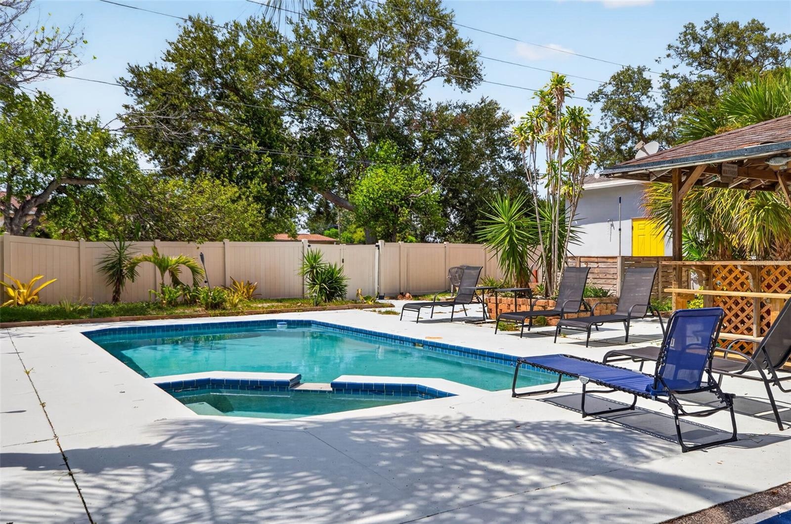 Pool and spa with expanded deck.