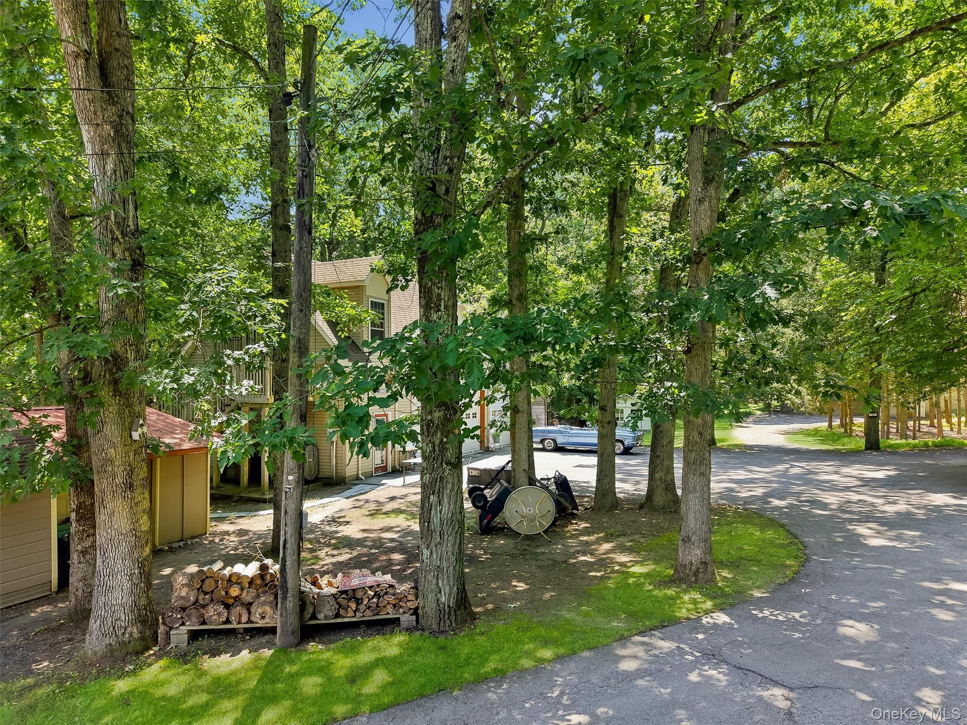 Continuing Driveway to Carriage House and 131 Hill Road.