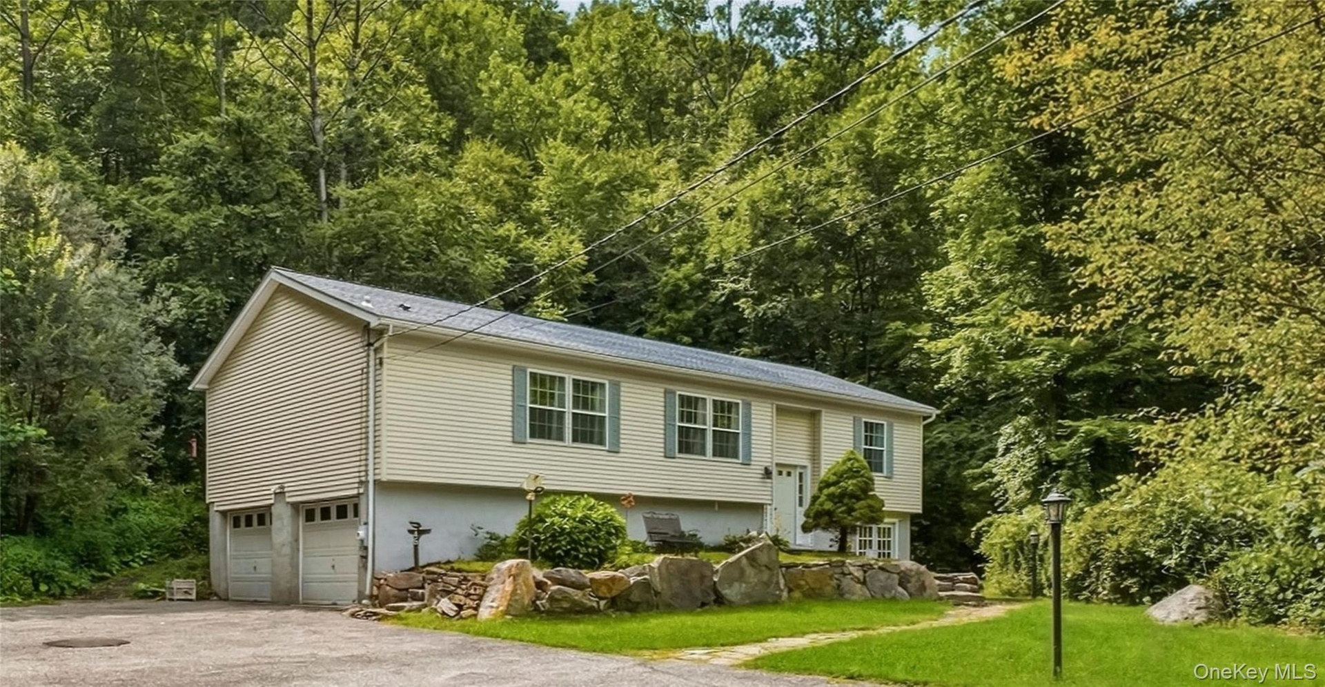 A Warm and inviting Raised Ranch with 3 Bedrooms and 3 Baths