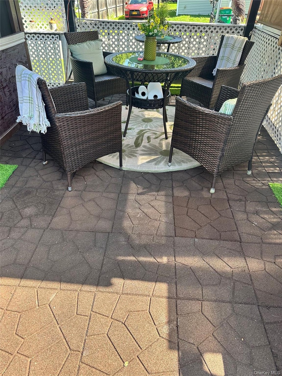 comfy group seating under gazebo on deck