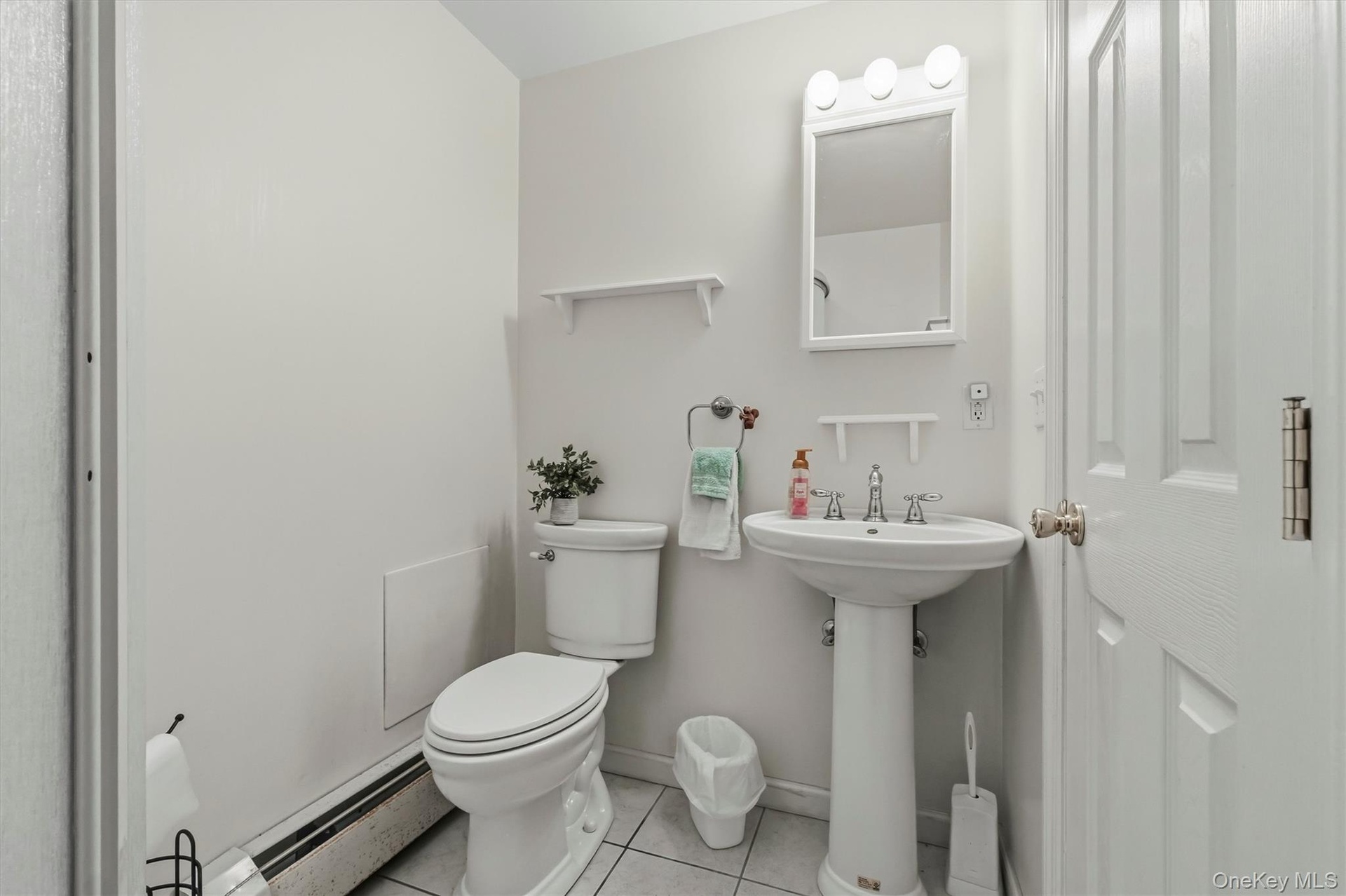 Bathroom #3 is conveniently located in the recreation room area.