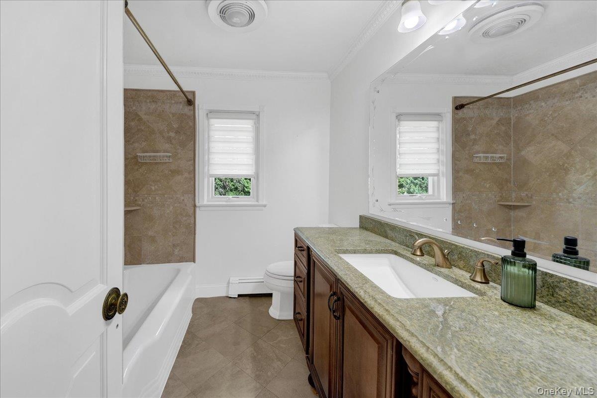 Full Updated Hall Bathroom with granite vanity