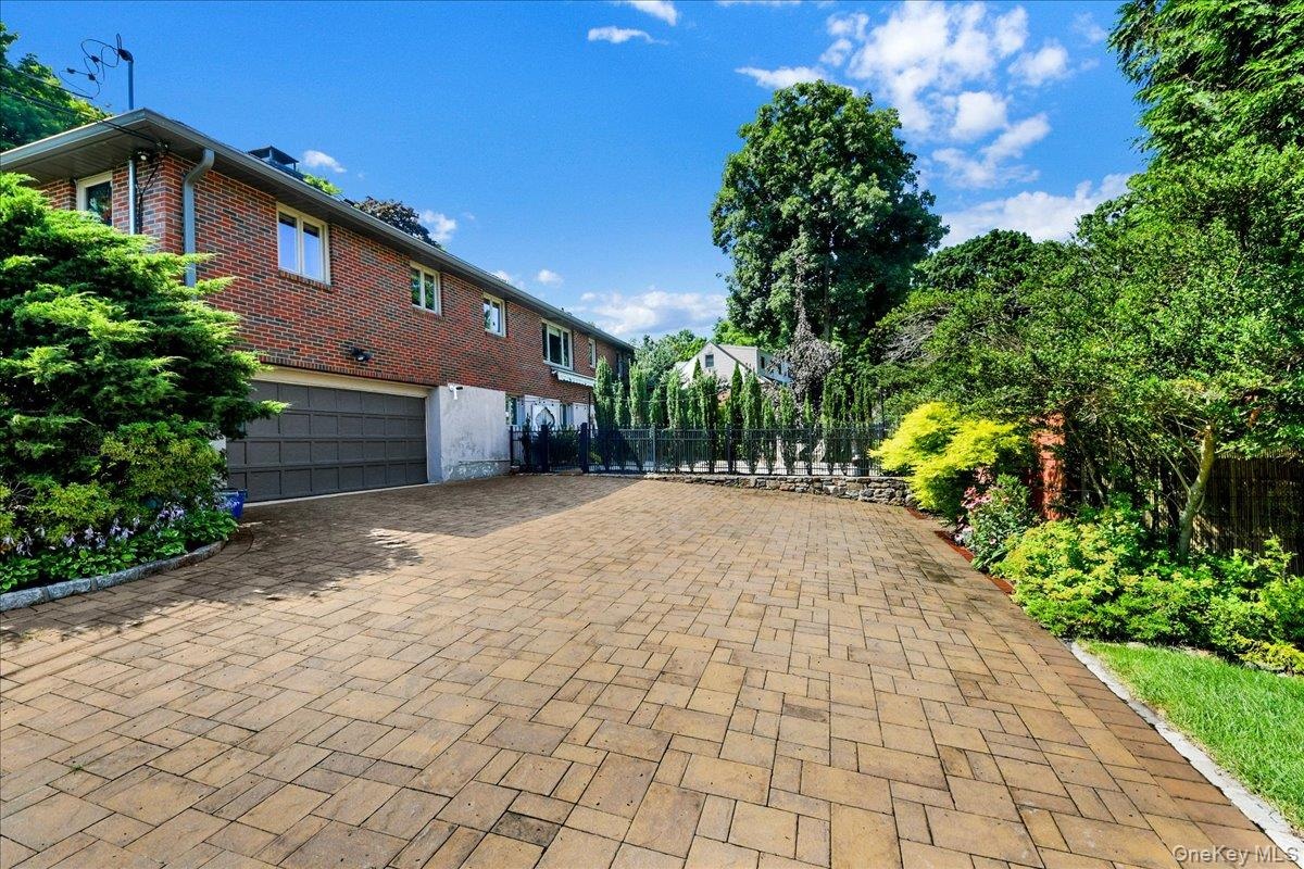 Paved Portion of driveway near garage entry