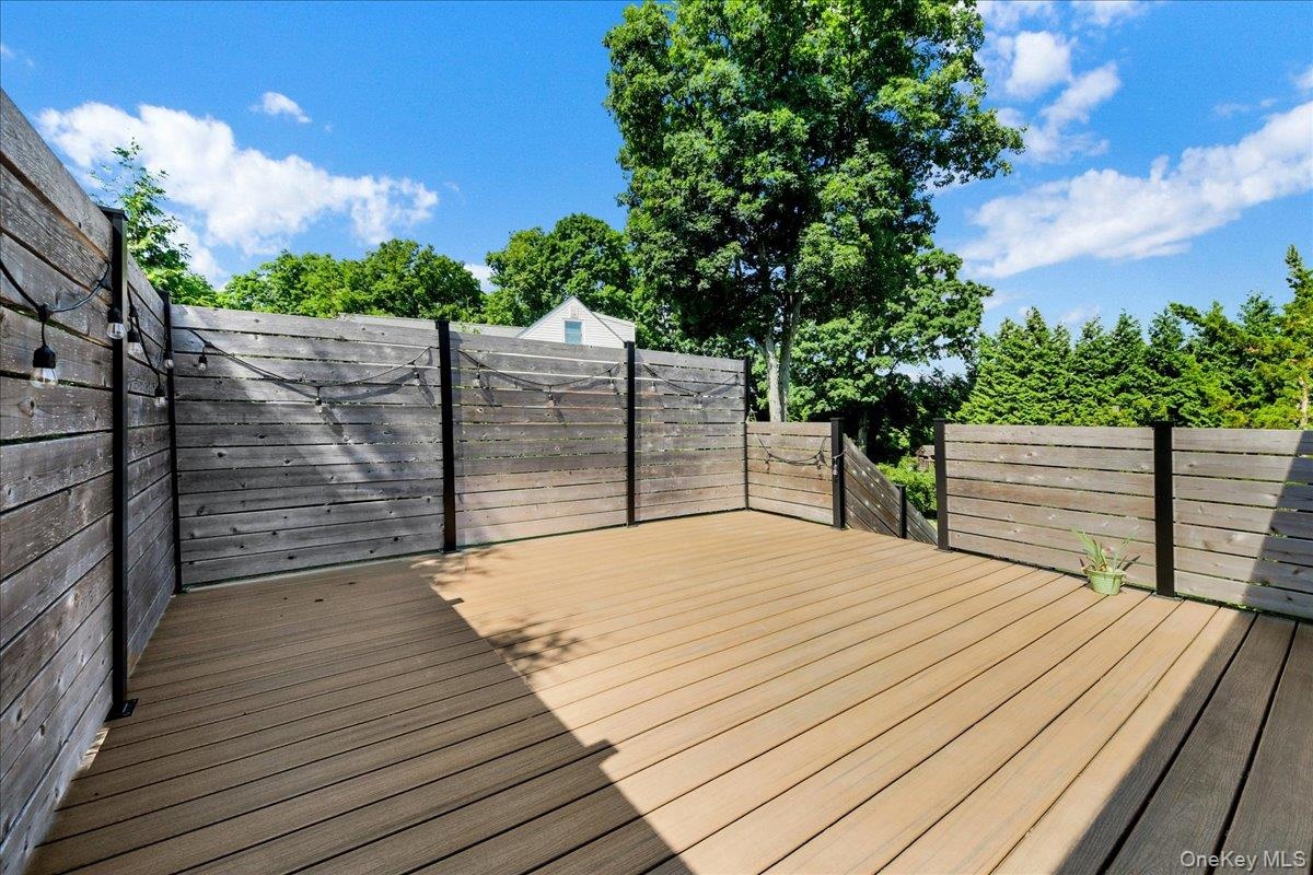 Private enclosed deck with access through primary bedroom