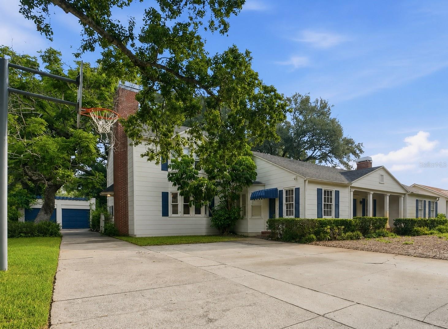 Garage detached to the back left of the home, Side entrance into the office