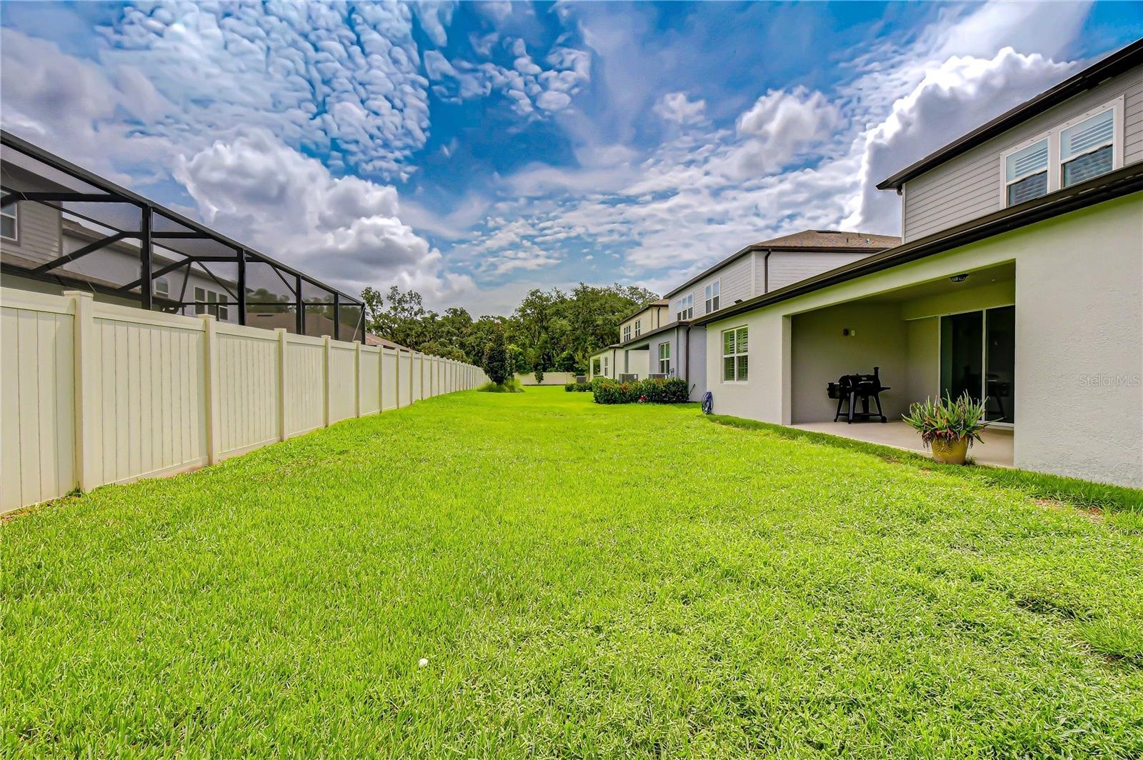 Spacious backyard ready for future outdoor living enhancements.