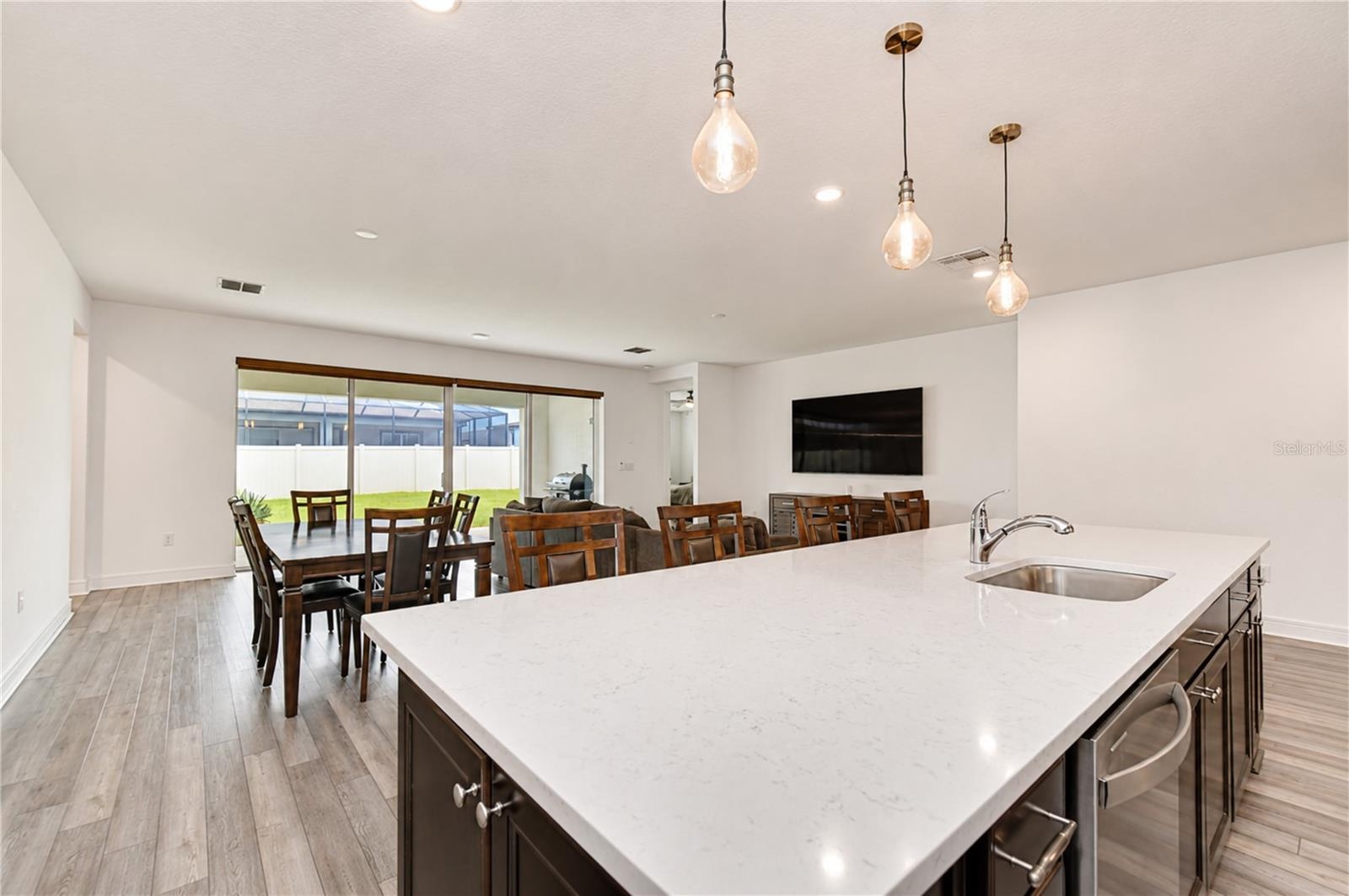 Spacious center island perfect for gathering and meal preparation.