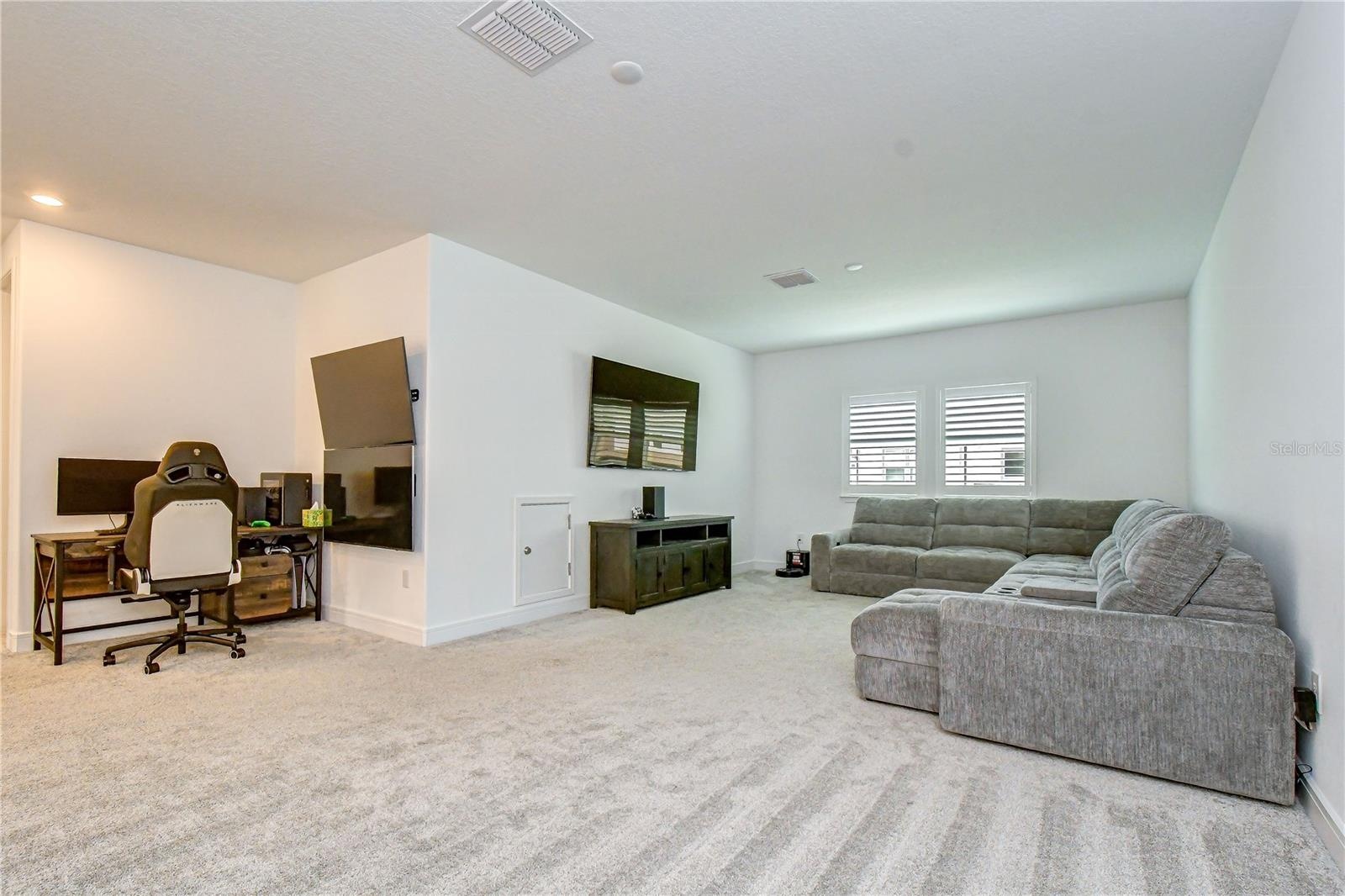 Ideal for a media room, game room, playroom, or second living area.