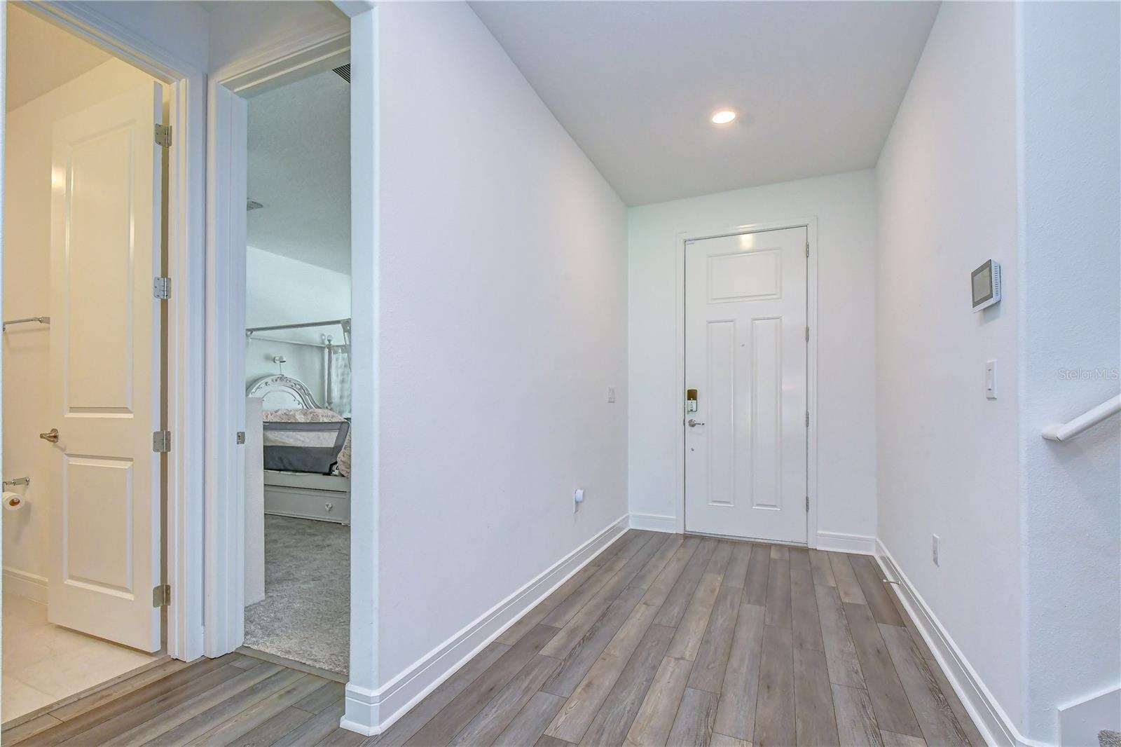 Bright, welcoming entry featuring soaring 8-foot interior doors.