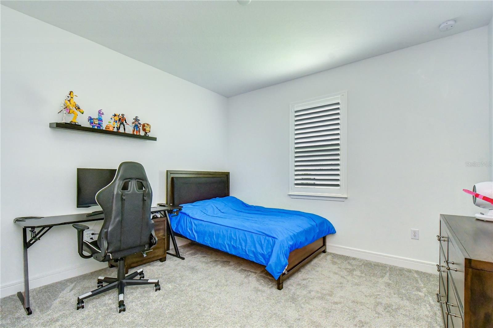 Spacious secondary bedroom located on the main level.
