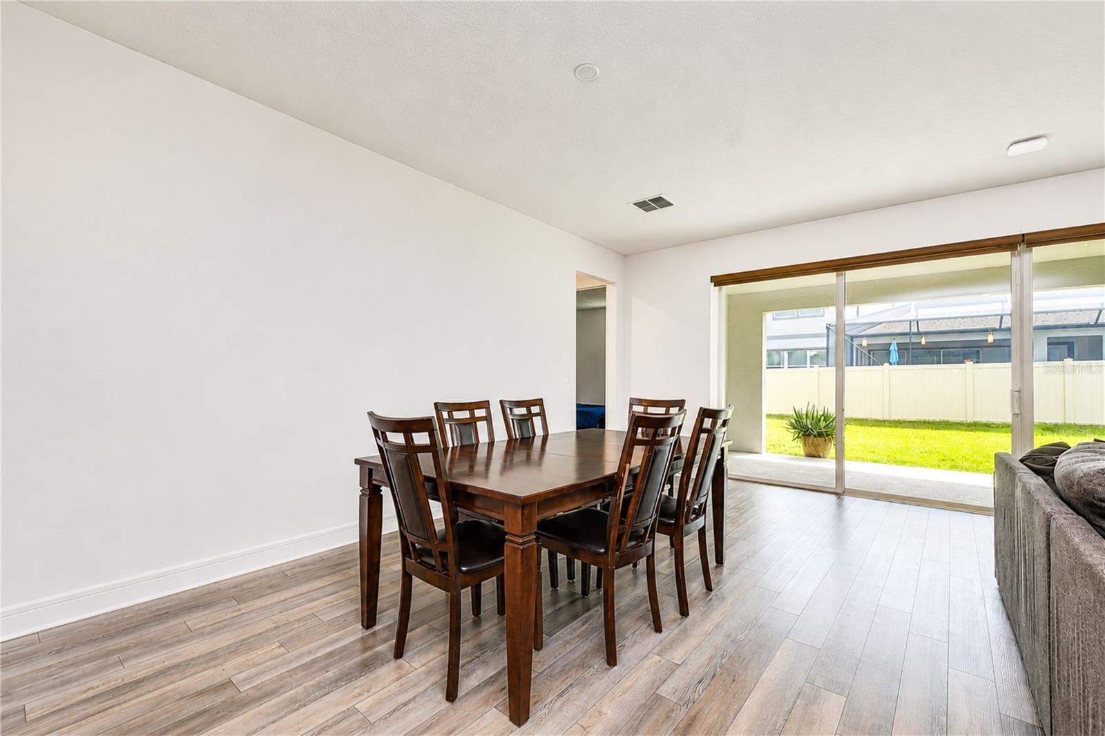 Seamlessly connected dining space overlooking the great room.