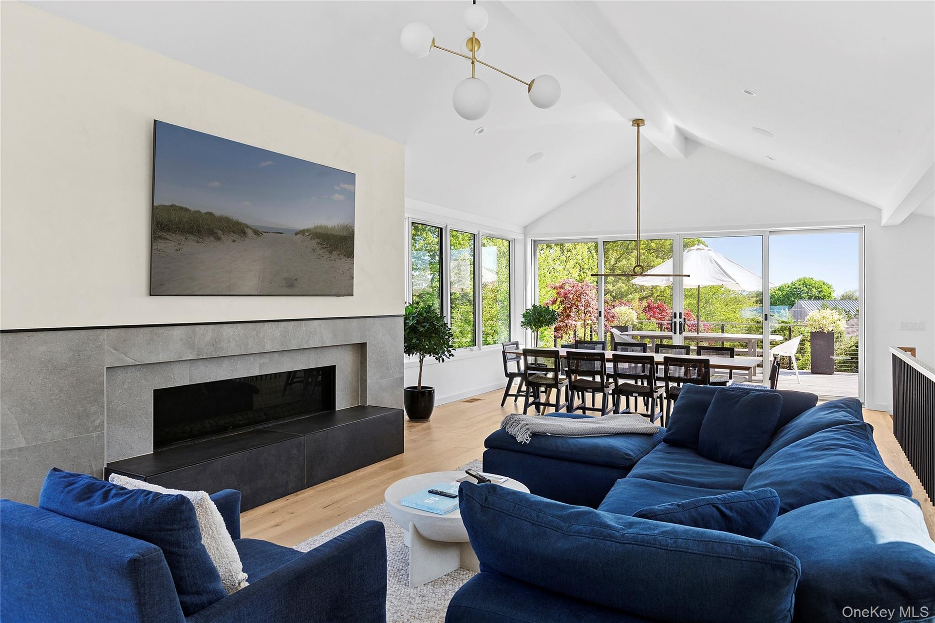 Open living with fireplace