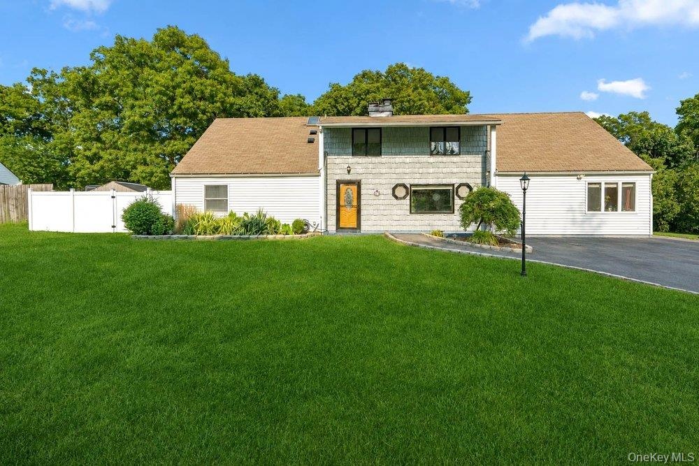 Large Colonial with 5 Bedrooms and 3 Baths on 1/3 acre.