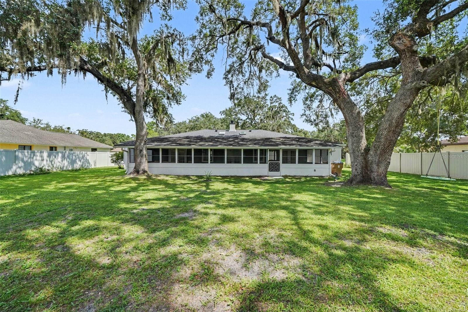 Screened Back Porch & Tranquil mostly fenced Back yard