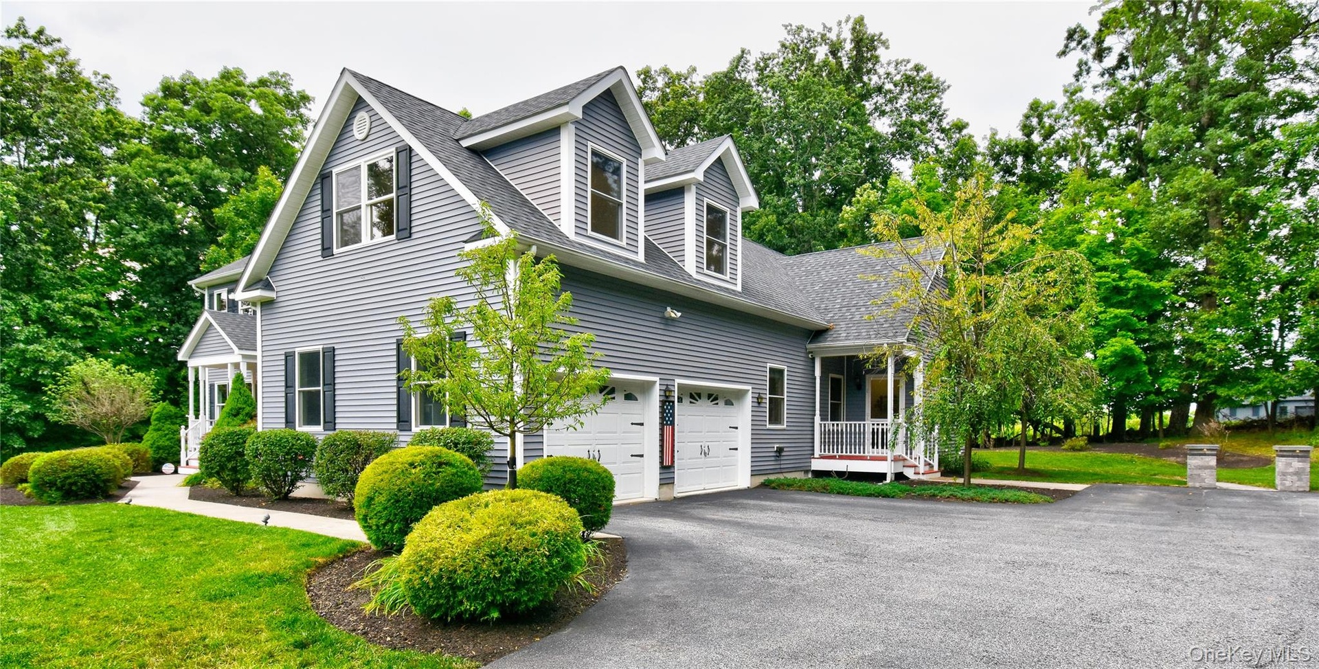2 car garage and ample parking. Side entrance to with legal accessory apartment