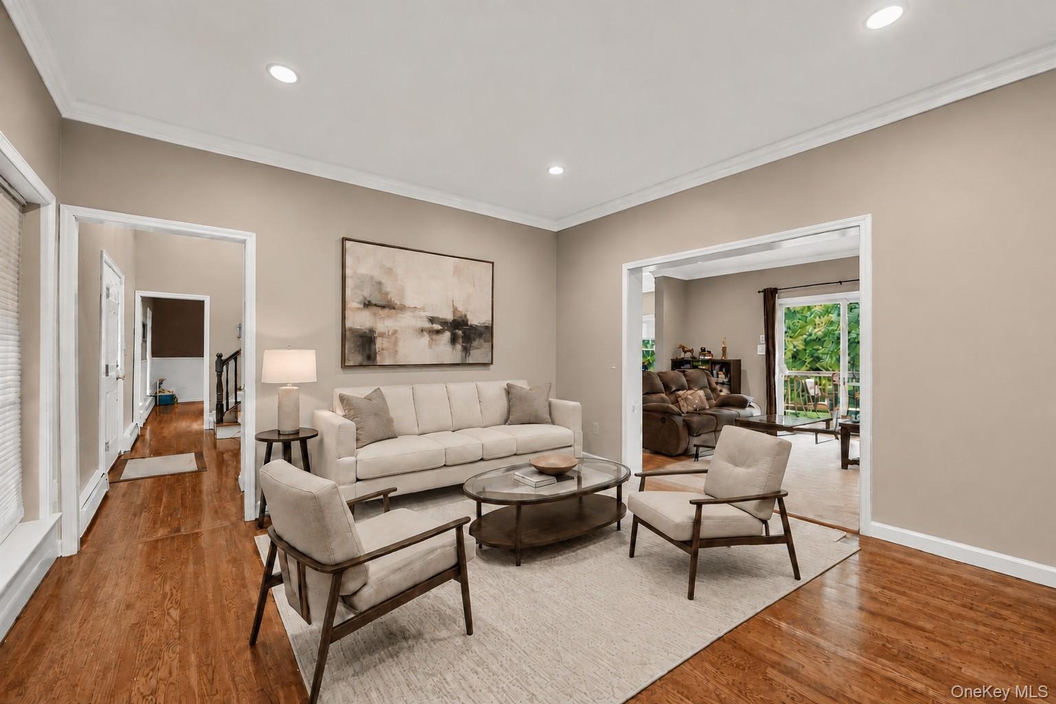Virtually staged formal living room.