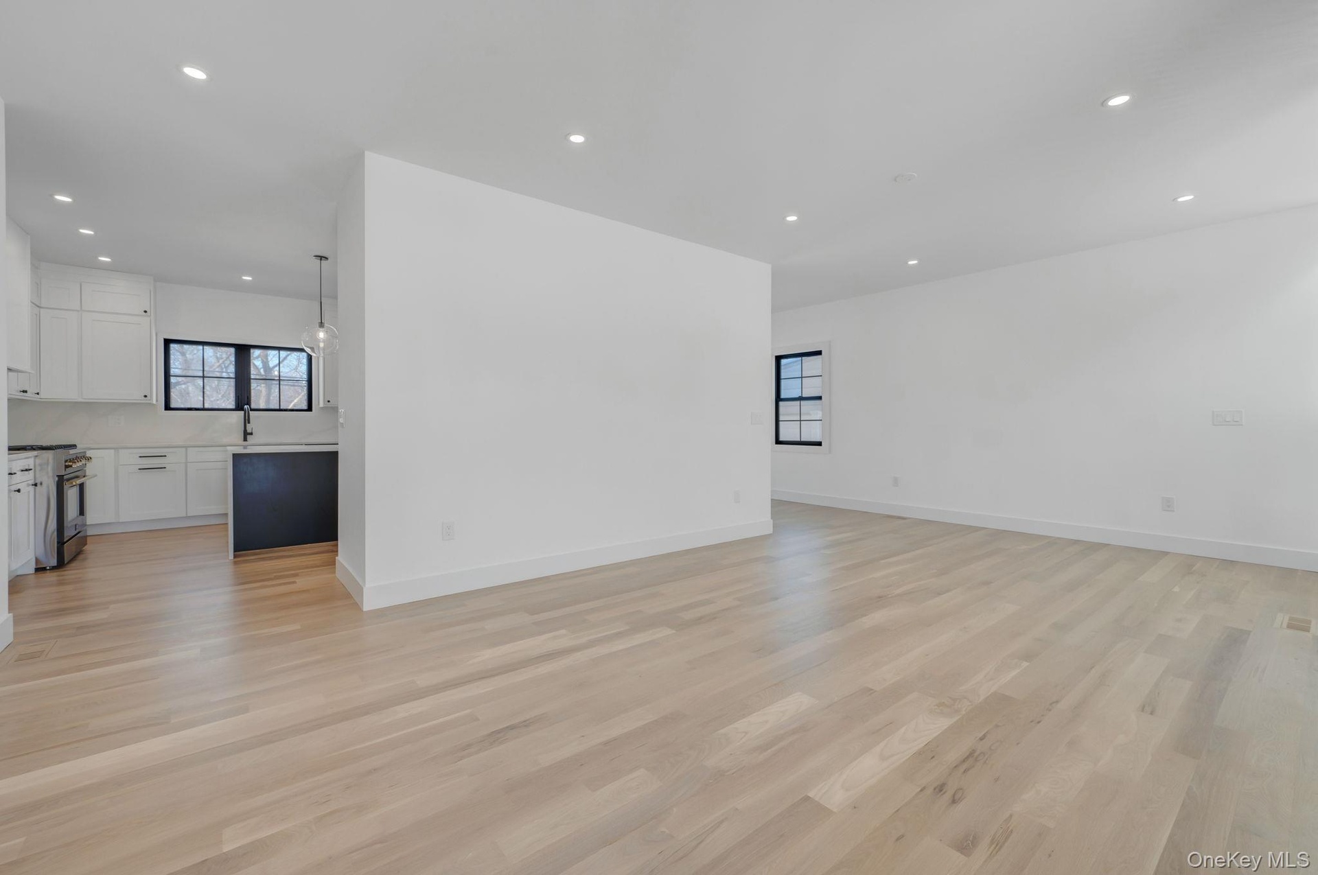 Bright and welcoming entry with clean architectural lines and natural light that immediately sets the tone of the home.