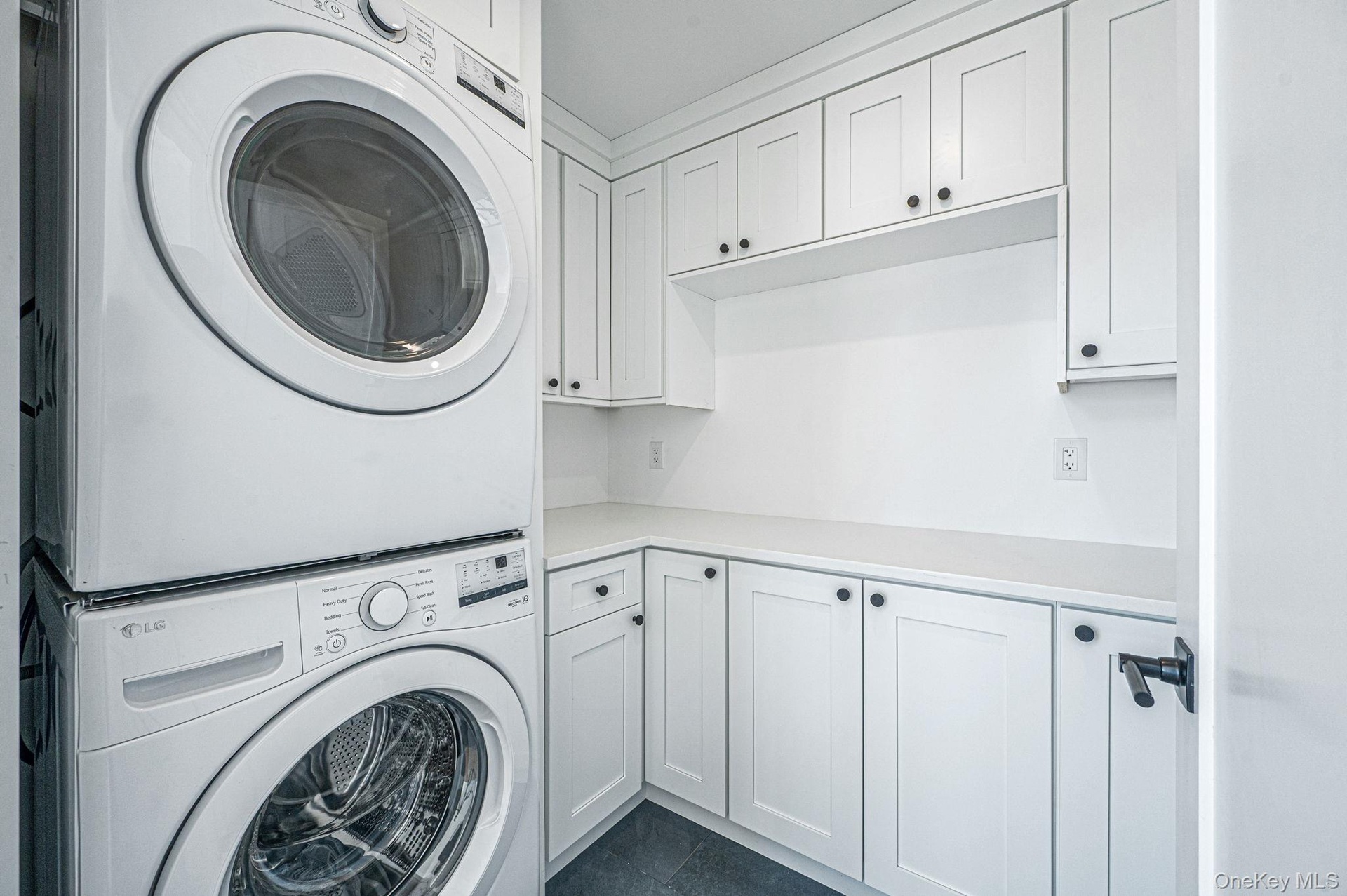 Convenient second floor laundry room located near bedrooms for everyday ease.