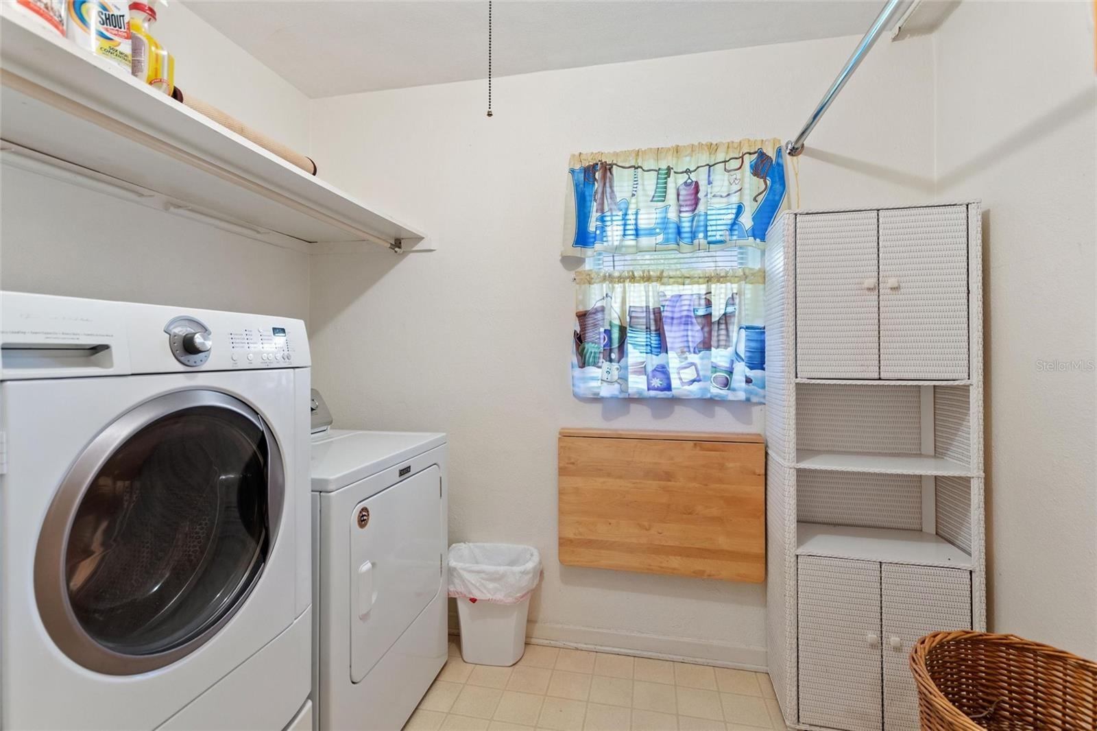 Laundry area accessible from the private suite.