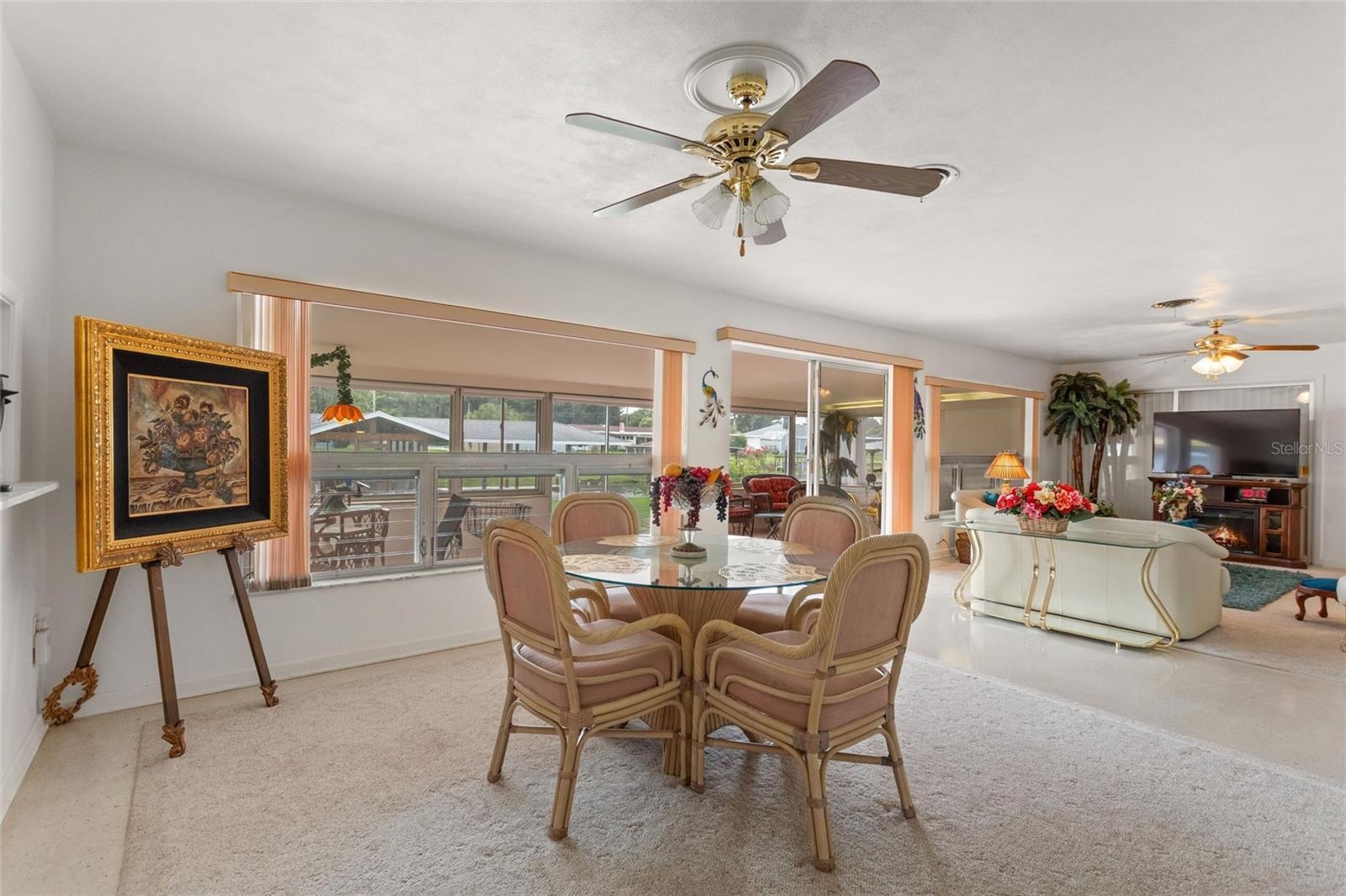 Reverse view of informal areas with view of sun room
