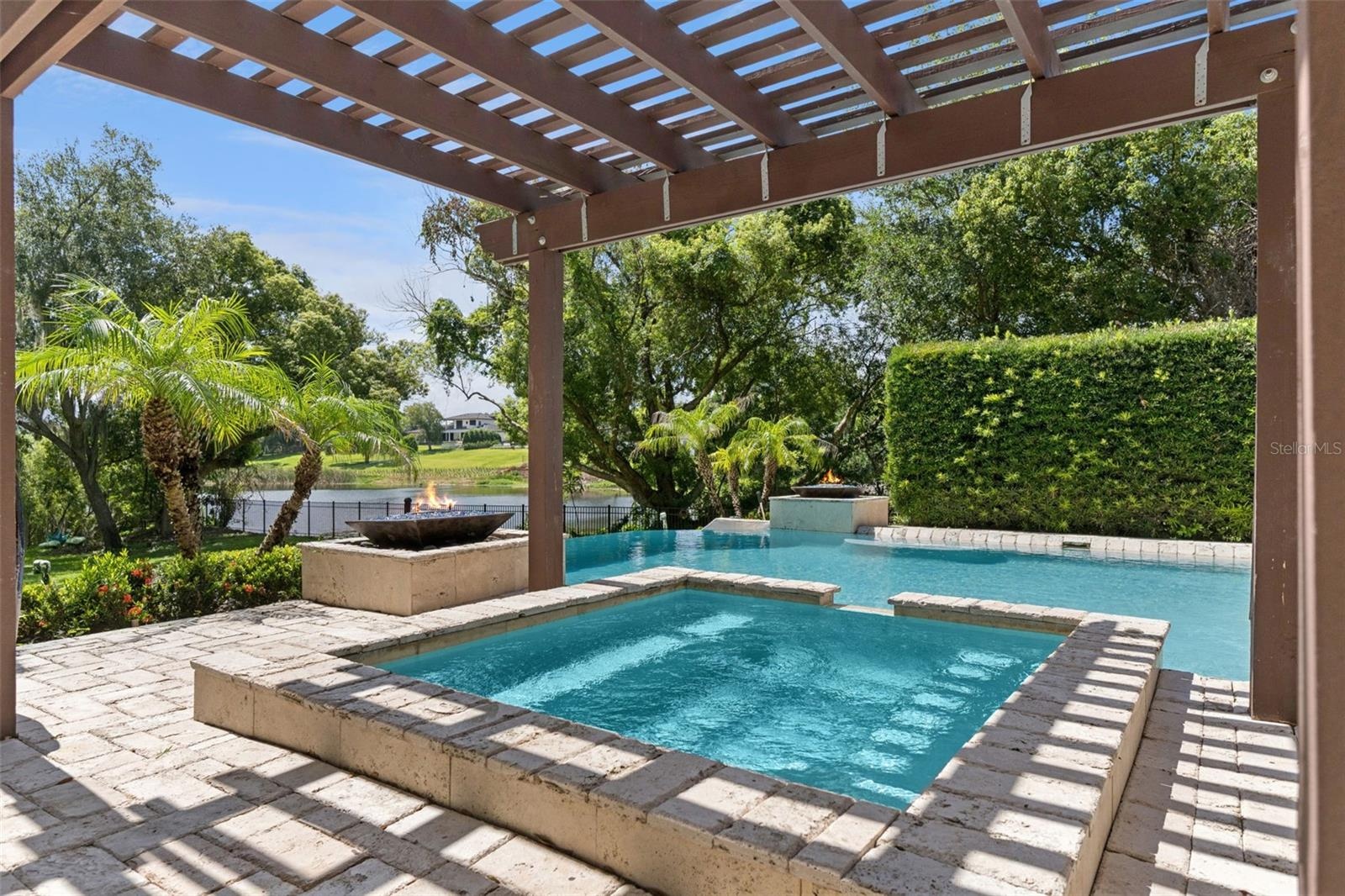 Pergola accents the pool experience