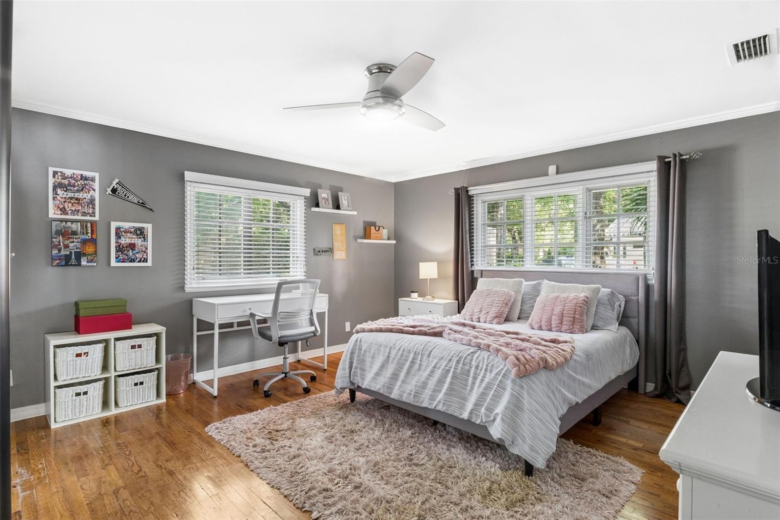 Bedroom #2 with customed closet and natural wood floors